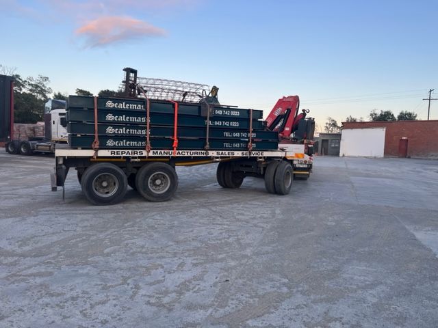 A truck with a crane on the back of it