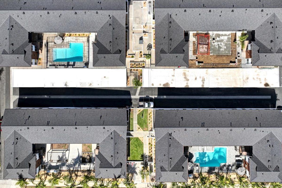 The Heights at Signal Hill Aerial view of all pools