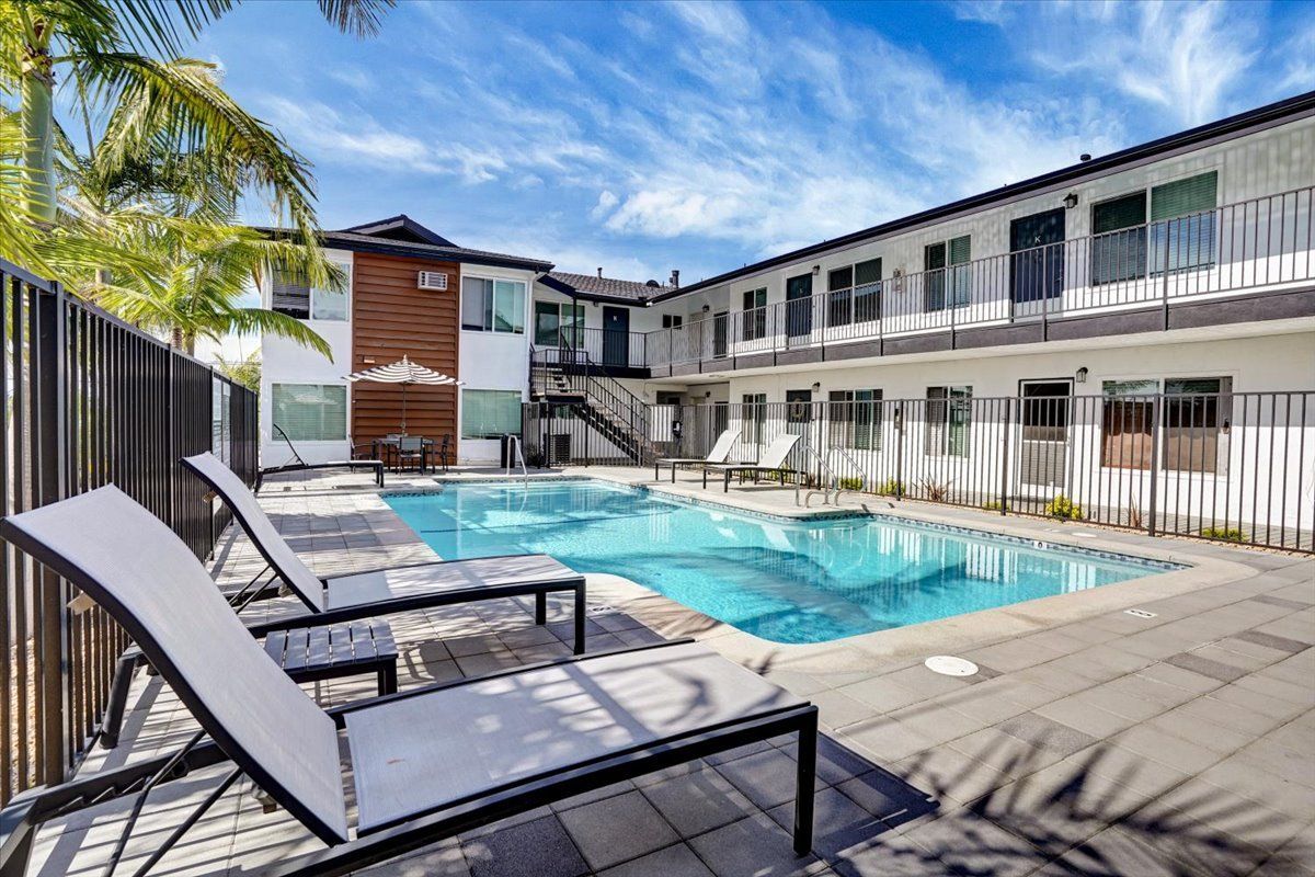 The Heights at Signal Hill Swimming Pool and lounge chairs