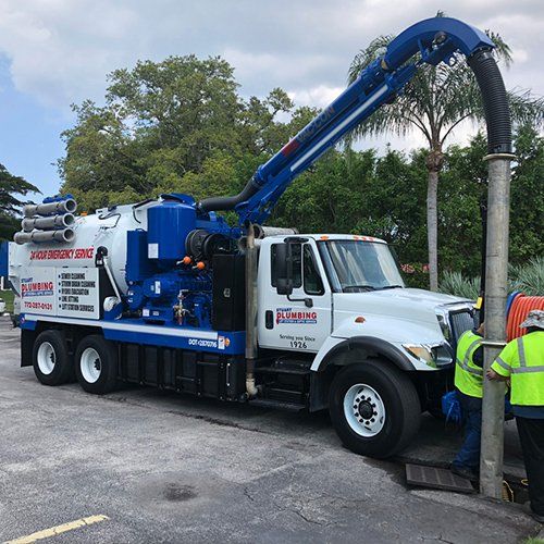 Vac Truck With Worker — Stuart, FL — Stuart Plumbing