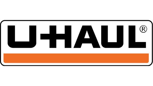 the u-haul logo is orange and black on a white background .