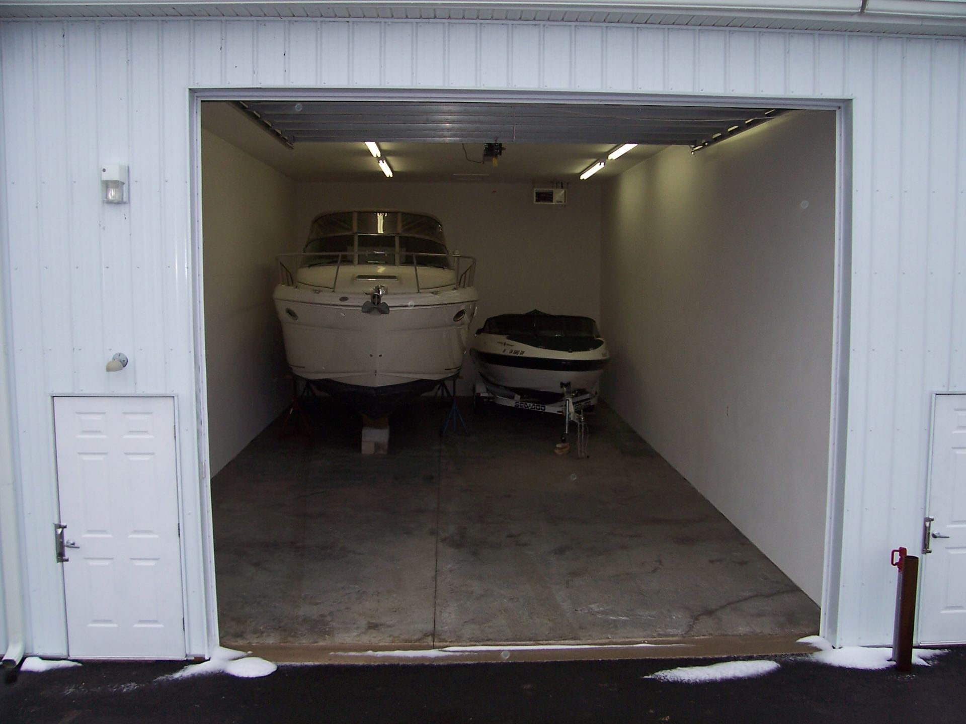boats inside storage condominium / man cave in port clinton ohio