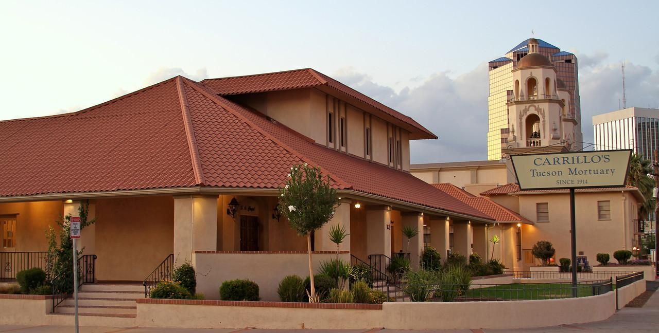 Cahokia Mounds Museum, a tan building with a red-tiled roof, with a partially visible tower.