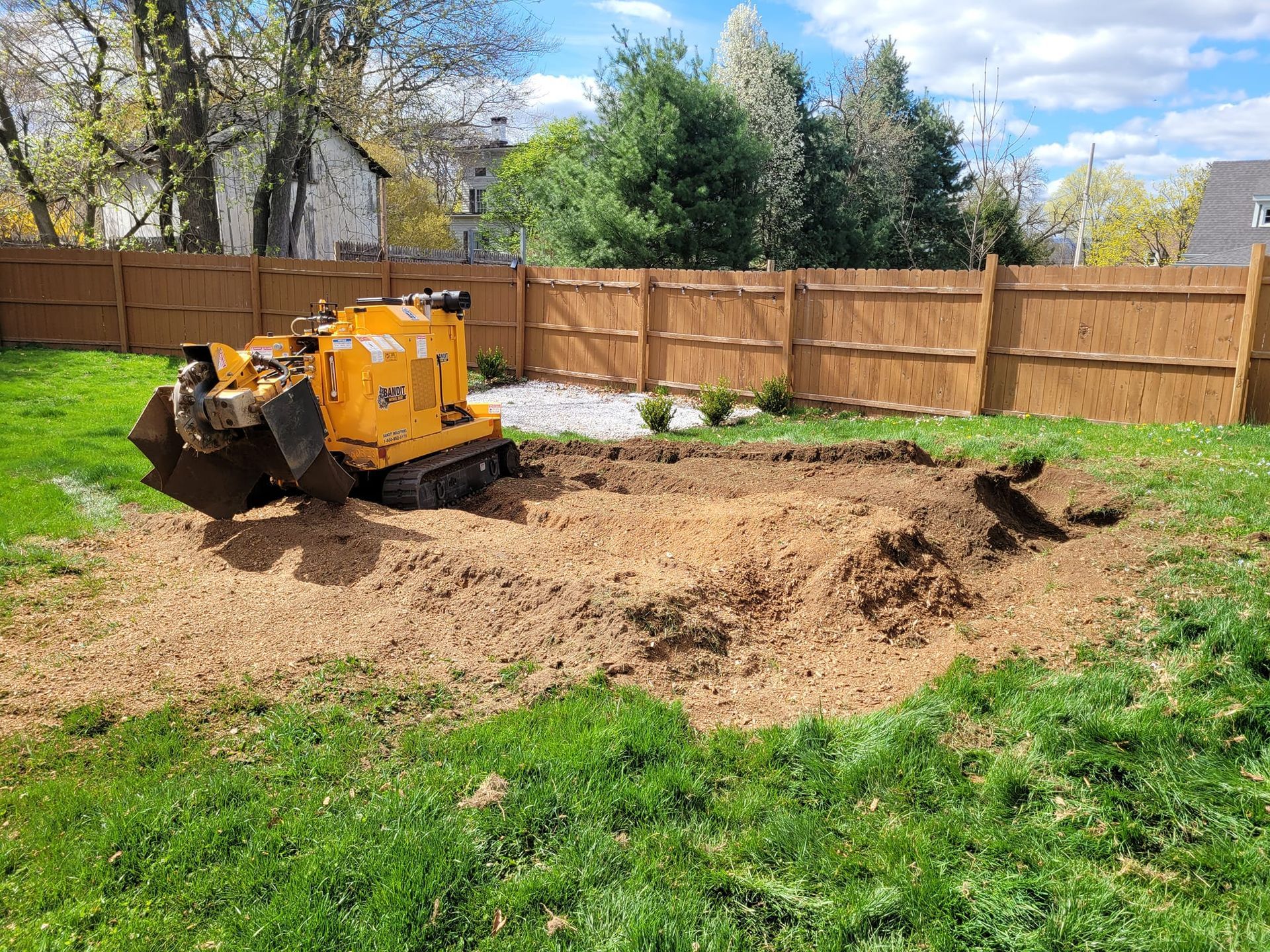 Stump grinding a residential lot