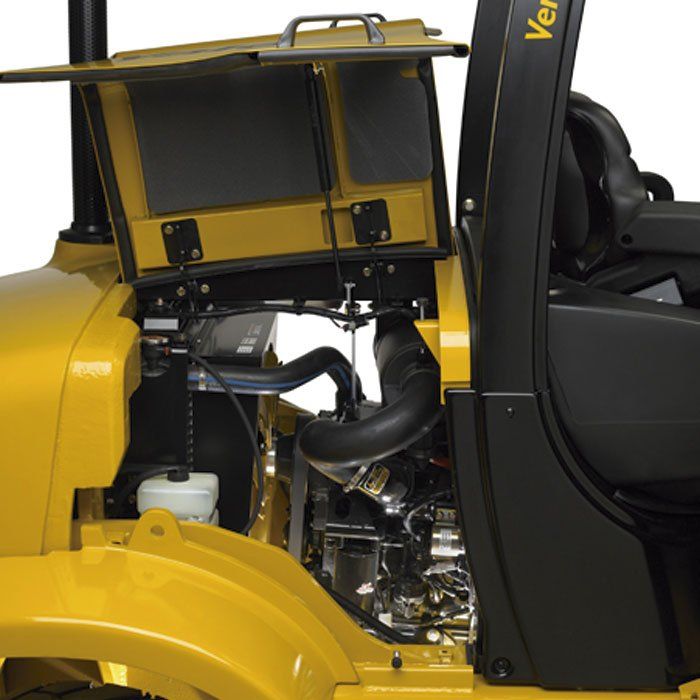 Un vehículo amarillo con la palabra ver al costado.