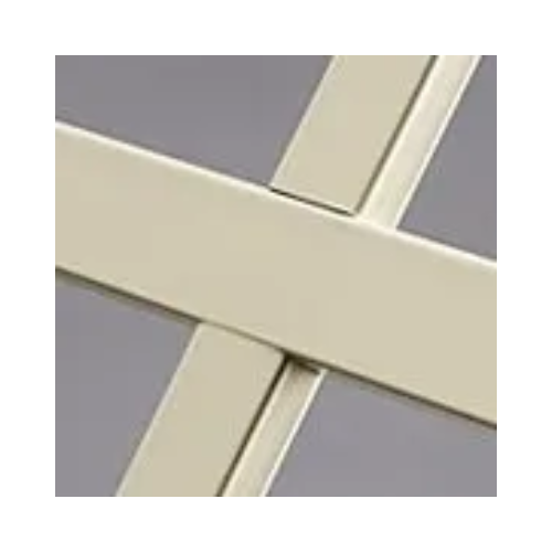 A close up of a white cross on a gray background.