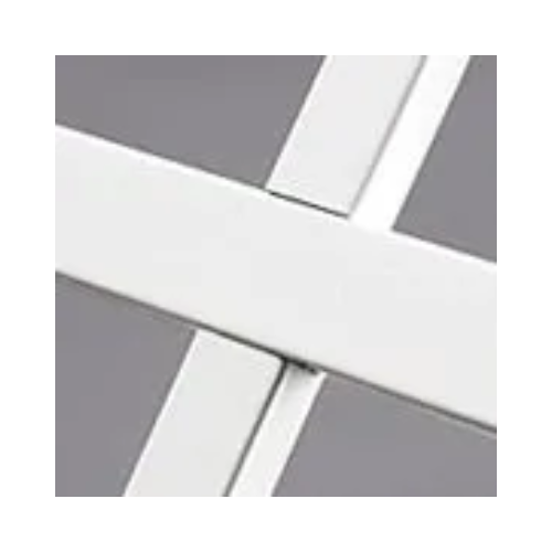 A close up of a white cross on a gray background.