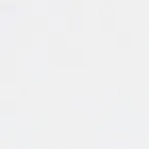 A close up of a white background with a plain texture.