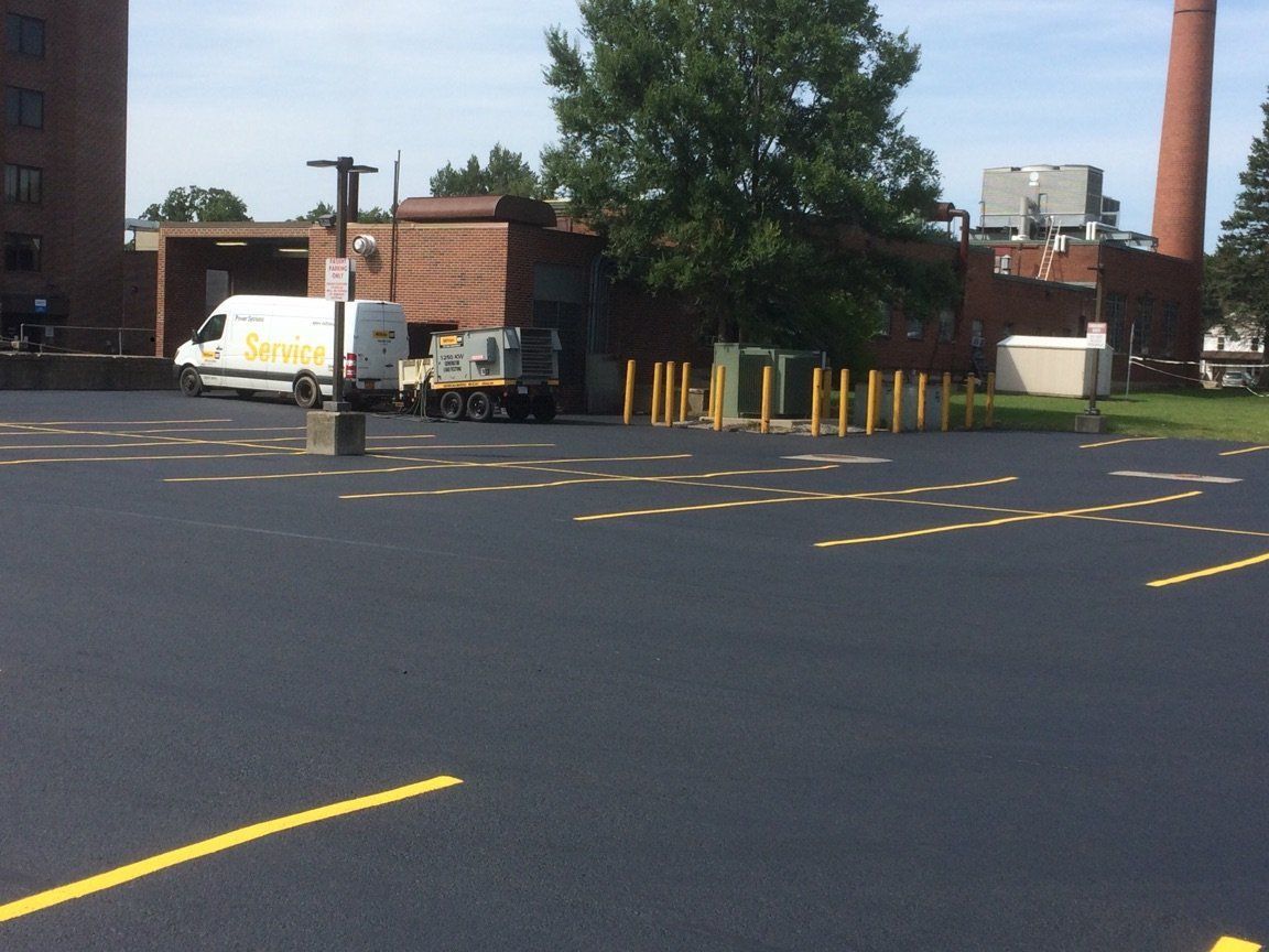 Paving contractor providing parking lot sealing services in Batavia, NY