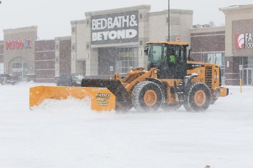 Snow removal for a store plaza in Batavia, NY