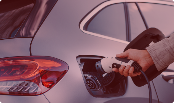 Electric car with a charger | BJ’s Automotive Diagnostic Center