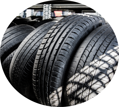 a bunch of tires are stacked on top of each other | BJ's Automotive Diagnostic Center