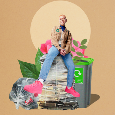 A woman is sitting on top of a pile of papers.