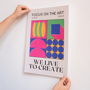 A poster that says focus on the art we live to create