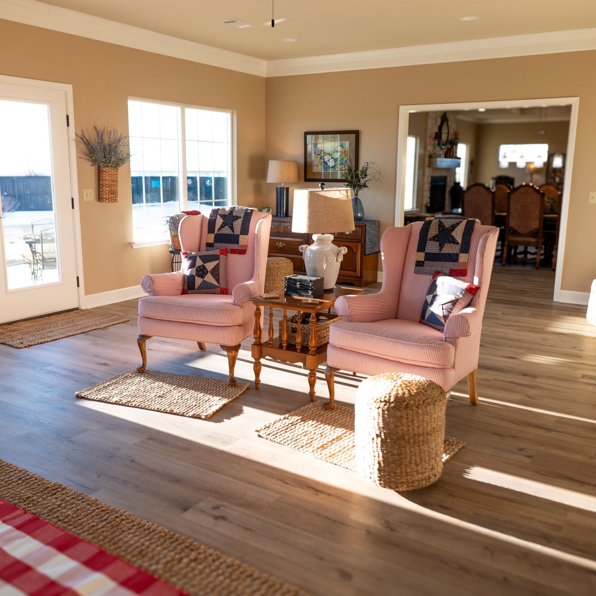 A living room with two chairs and a table