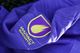 A close up of a purple shirt that says impact sports