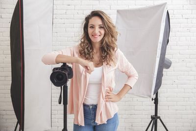 Female Photographer Posing With Camera