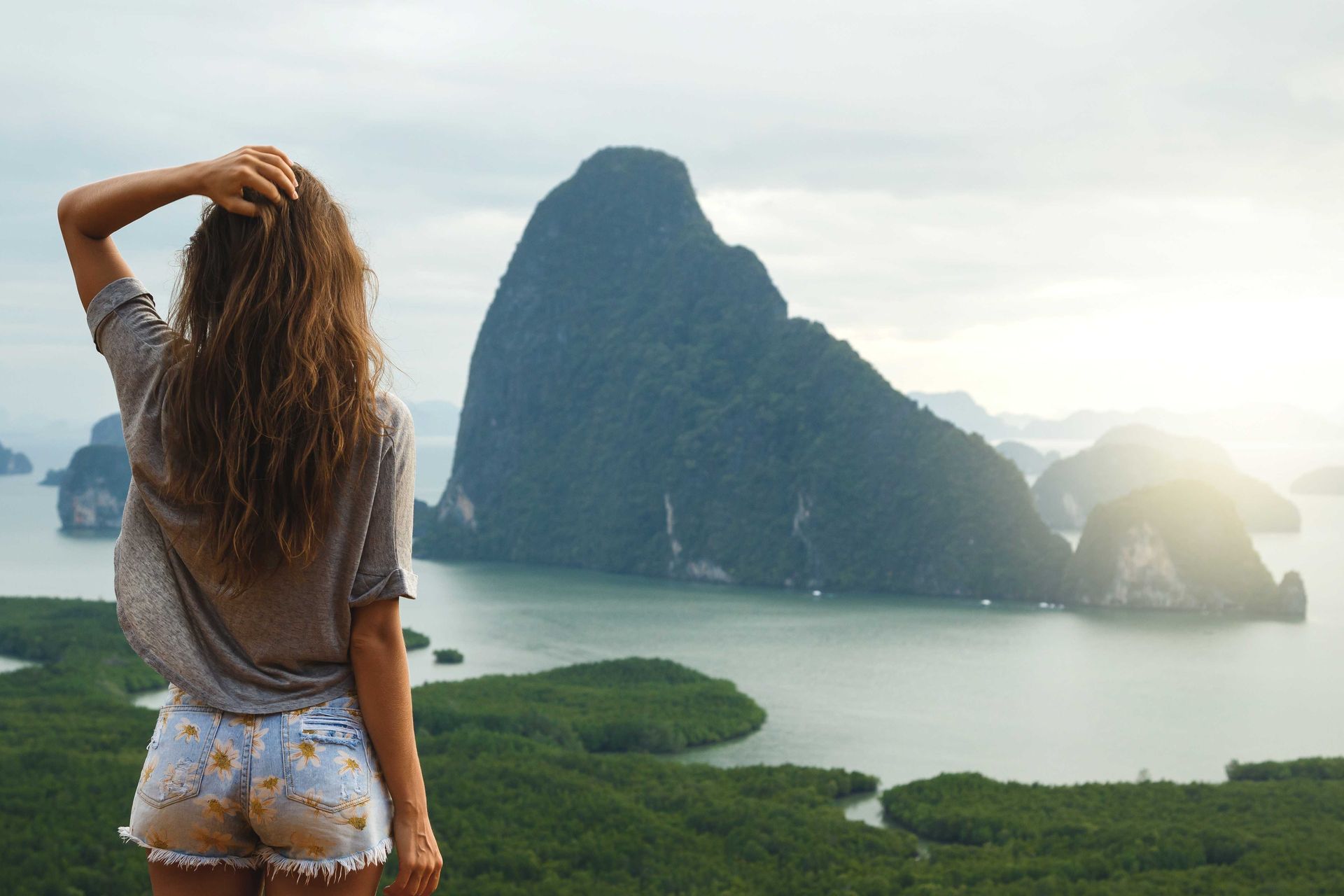 A woman taking in the gorgeous view of a mountain