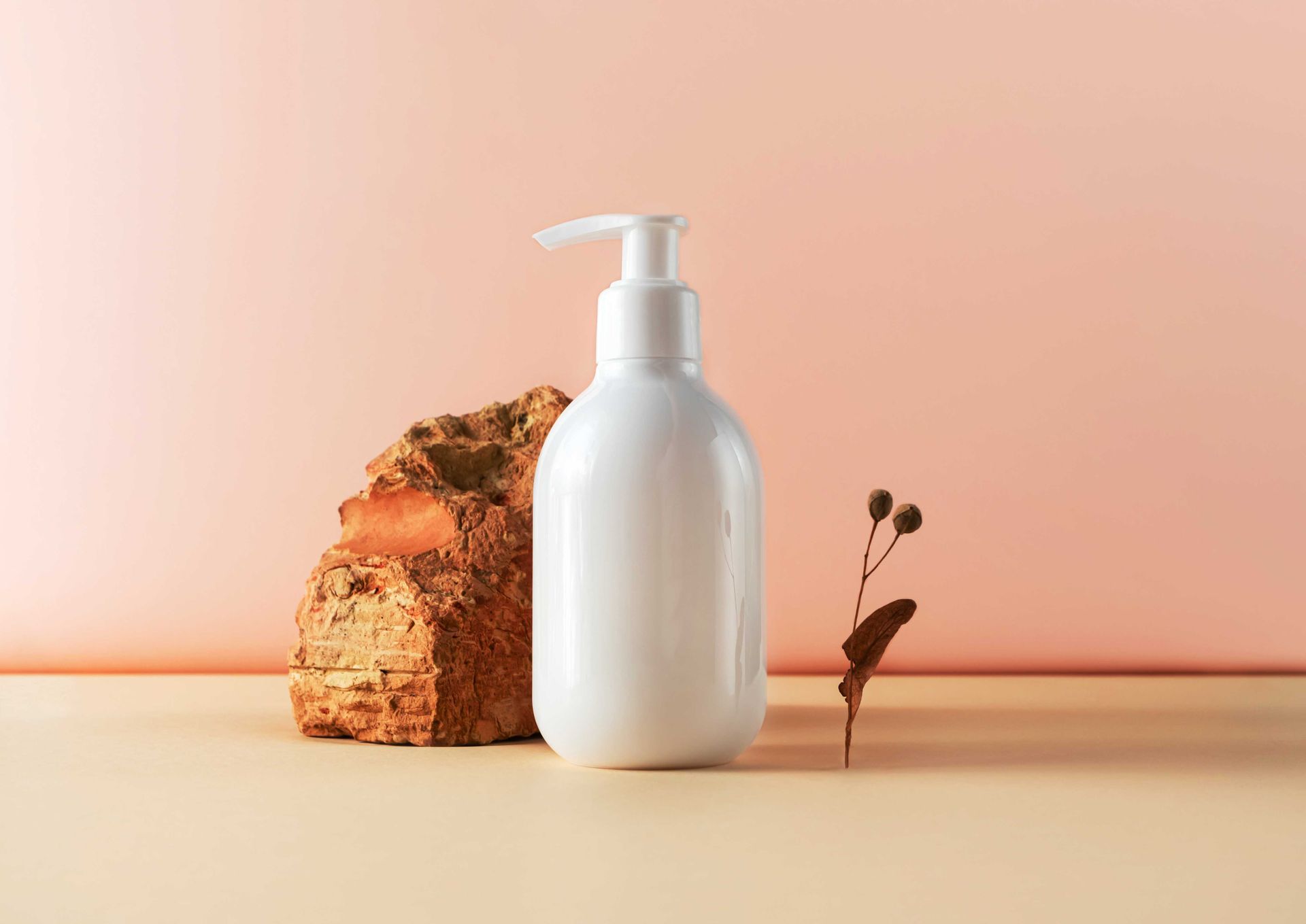 A bottle of lotion in a product photography shoot