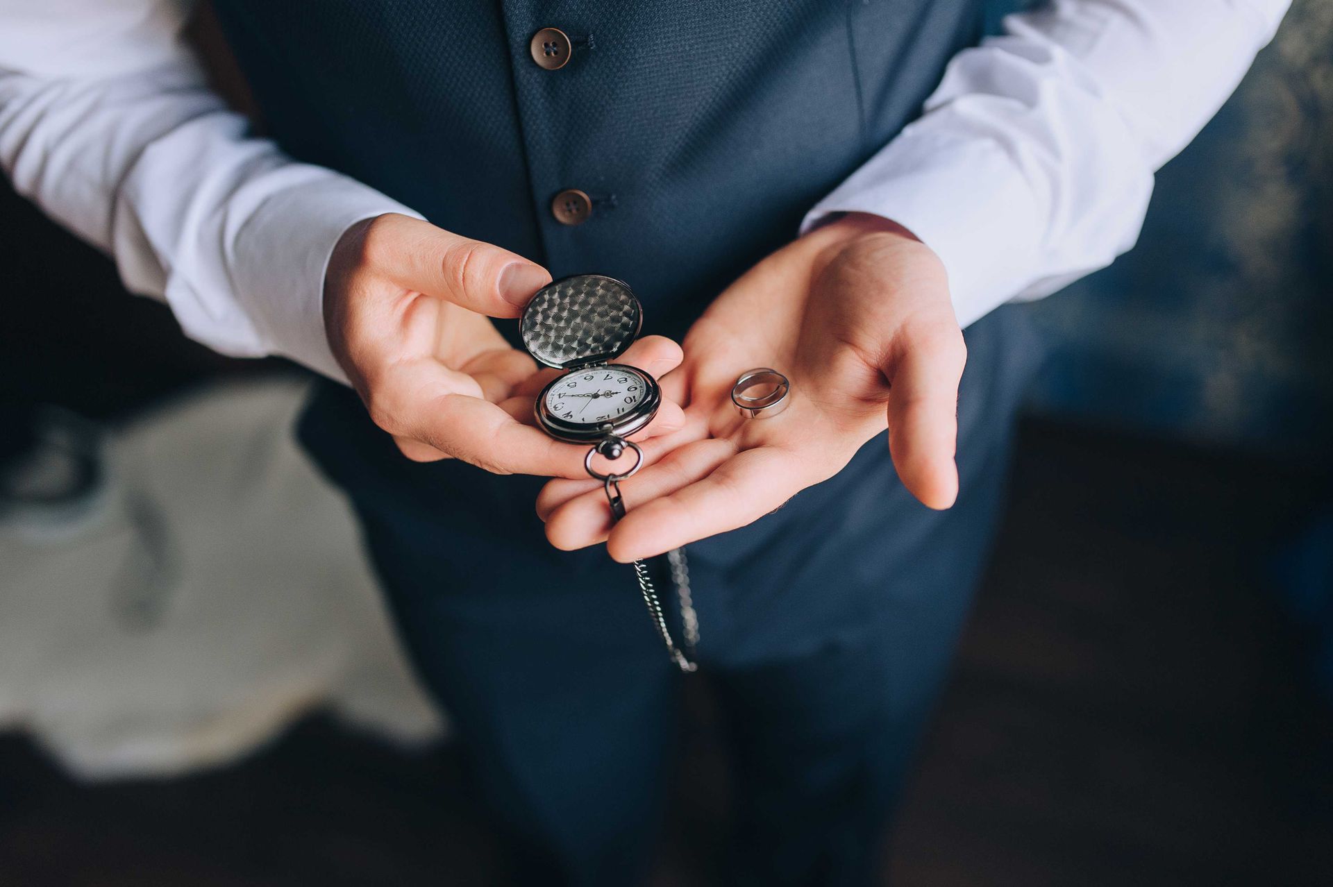 A man holding a watch in jewelry photography pic