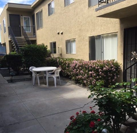 Patio area next to apartment building