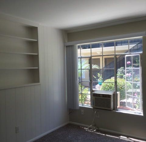 Room with a window that swings open