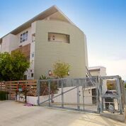 Apartment building with a gated driveway