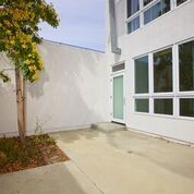 Exterior side entrance to apartment building