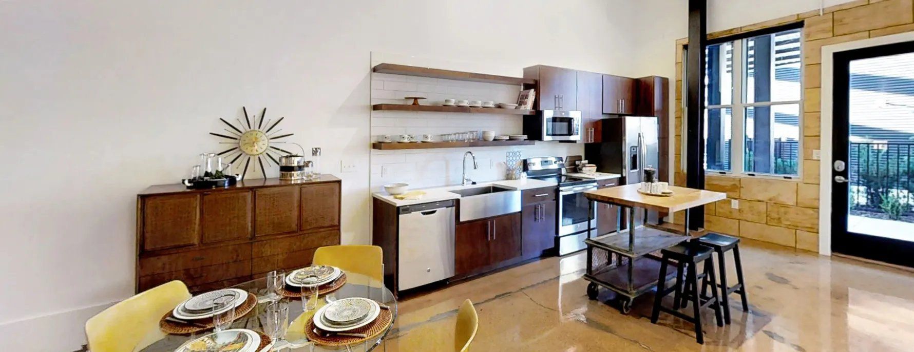 Modern kitchen with wood cabinets and stainless steel appliances