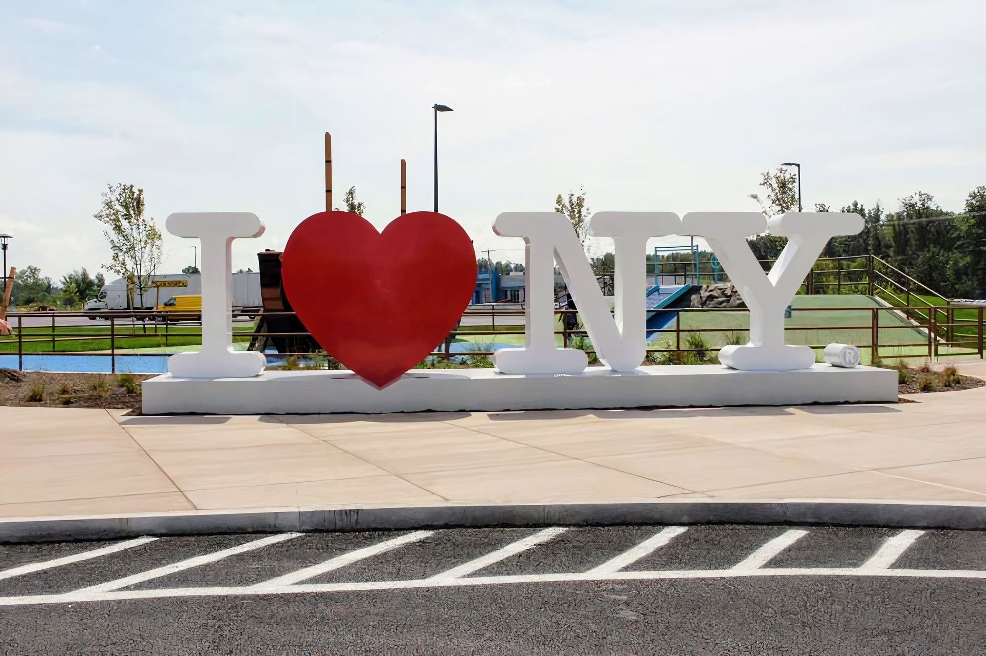 A large i love ny sign with a red heart in the middle