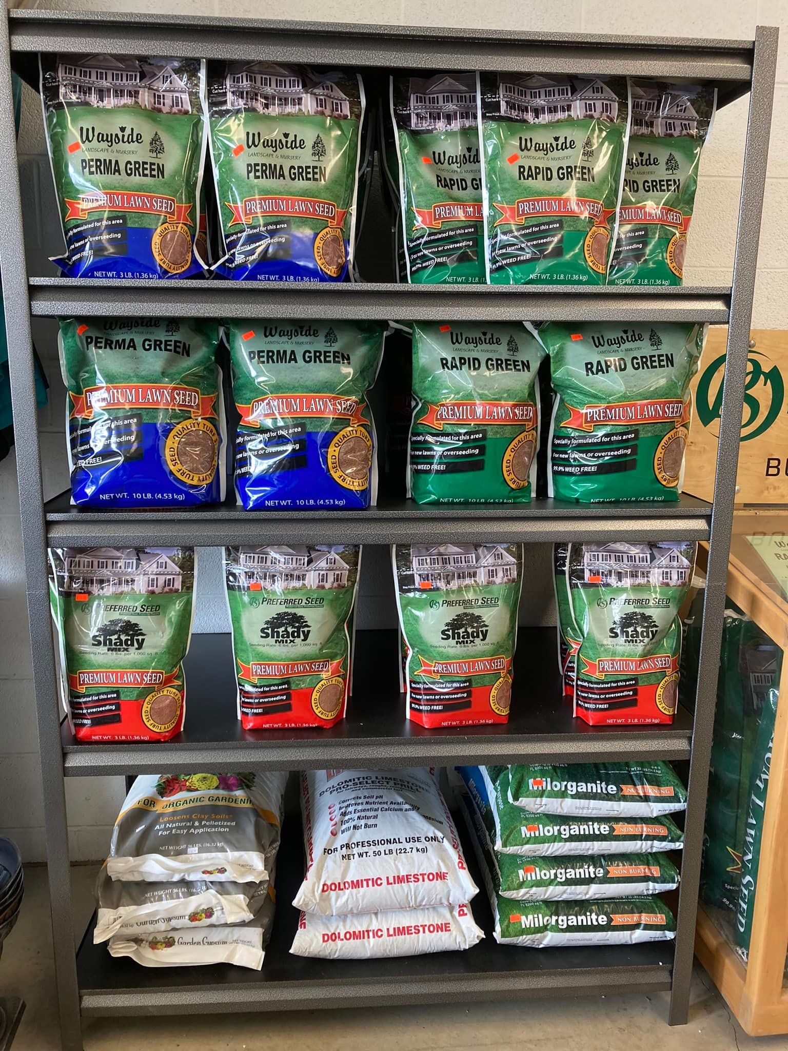 A shelf filled with bags of food in a store.