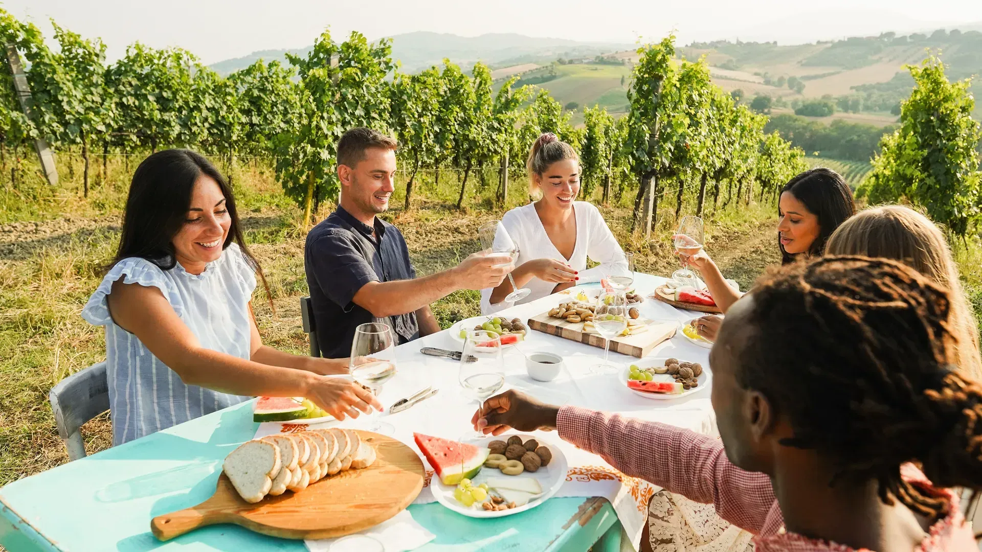 Team bonding wine tasting vineyard cheese