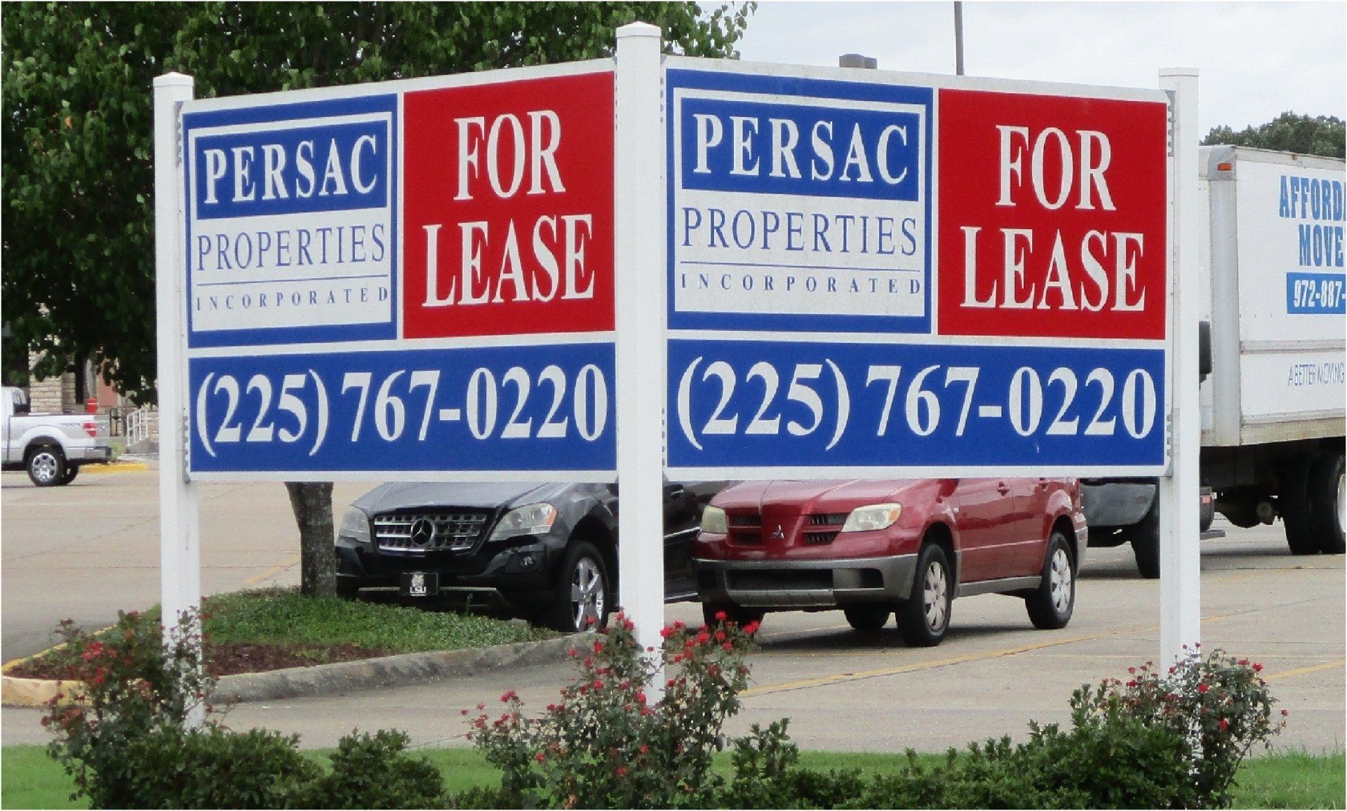 Two signs advertising 