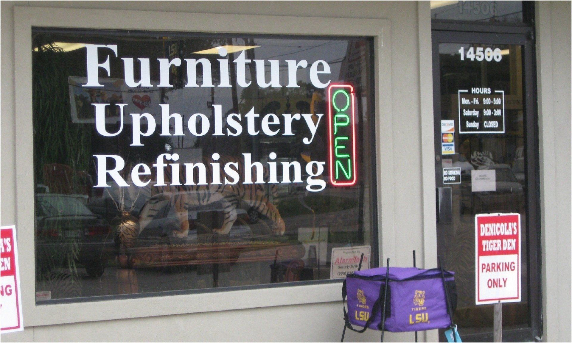 A storefront with a window displaying 
