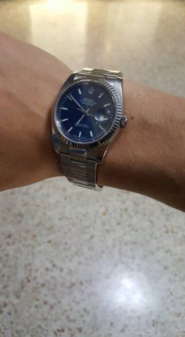 polso con orologio rolex