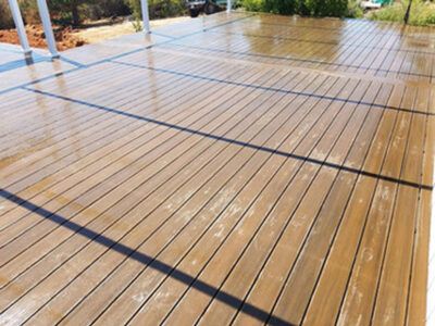 A wooden deck with a black line on it