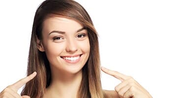 Girl Showing Her White Teeth — Bleaching - Tooth Whitening in Fort Walton Beach, FL