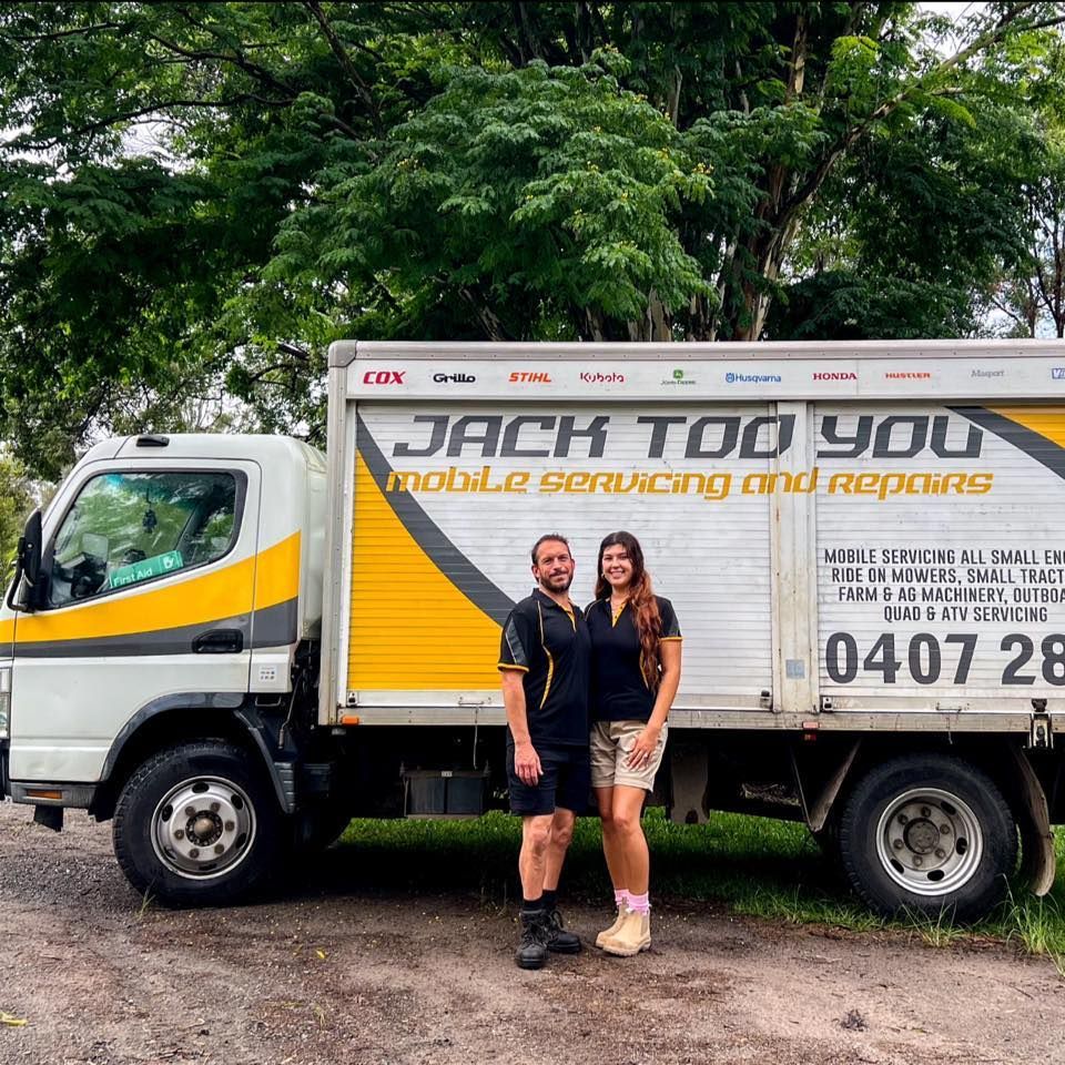 Man And Woman Standing Beside A Mobile Servicing Truck — Jack Too You Mobile Servicing and Repairs In Goomboorian, QLD