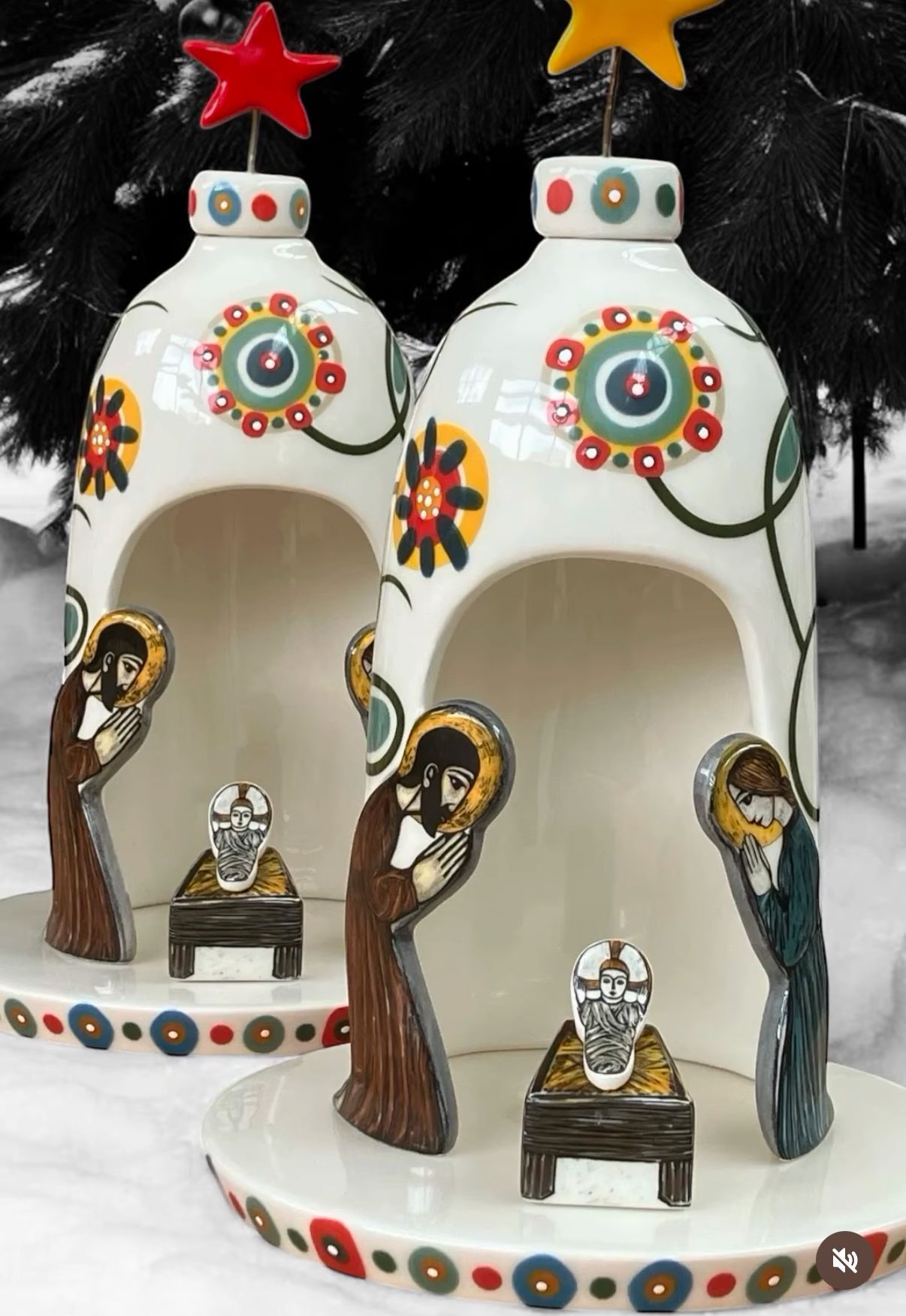 Un presepe con una stella in cima