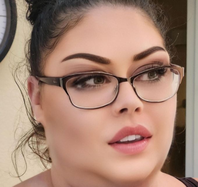 Young lady with glasses & extraordinary eyebrows. APowder Brow