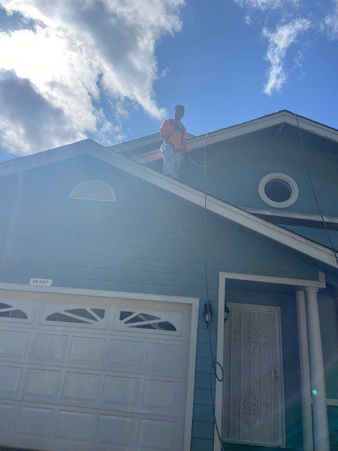 Man On The Top Of The Roof | Oahu, HI | Clinton’s Painting
