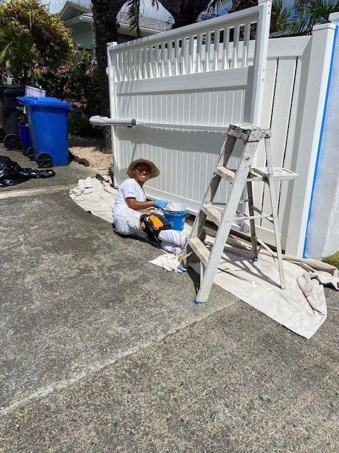 Happy Man With Paint Bucket | Oahu, HI | Clinton’s Painting