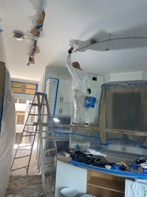 Man Painting the Ceiling | Oahu, HI | Clinton’s Painting