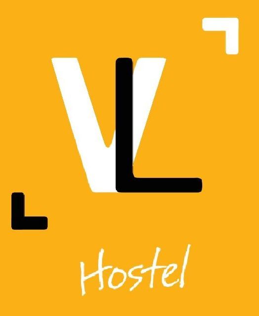 A yellow background with the word hostel on it