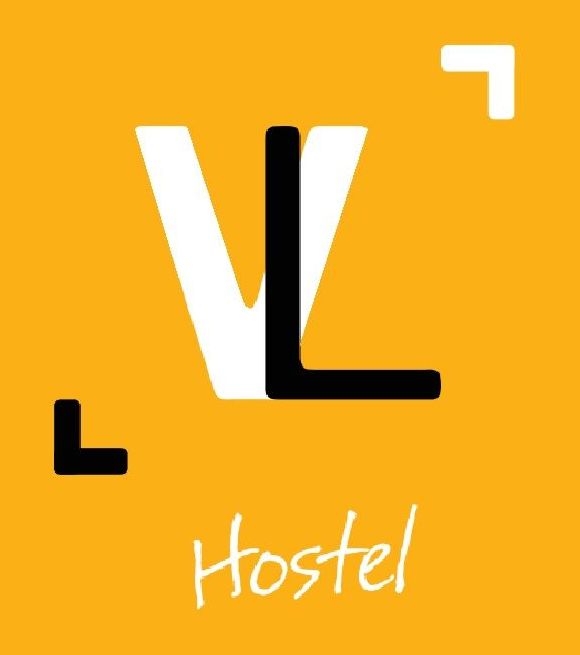 A yellow background with the word hostel on it