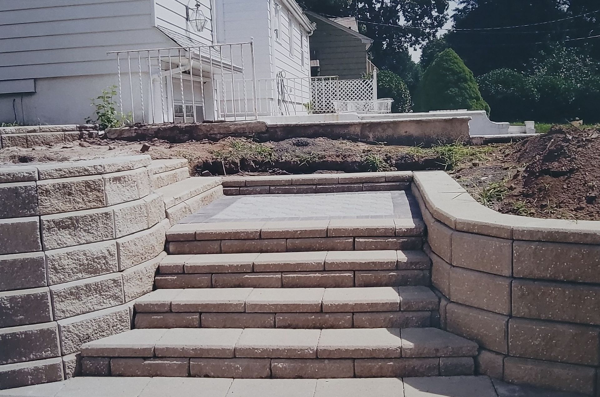 A set of stairs leading up to a house