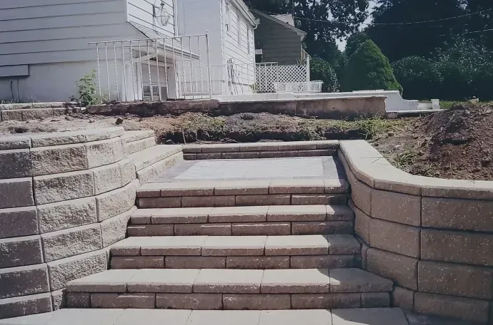 A set of stairs leading up to a house