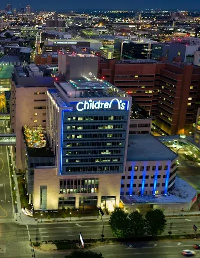 Children's Hospital building illuminated at night with 