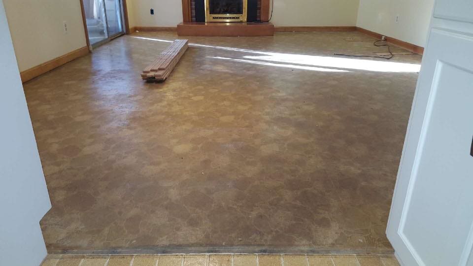 Before Installing A Living Room Laminated Flooring — Danbury, CT — VRP Flooring