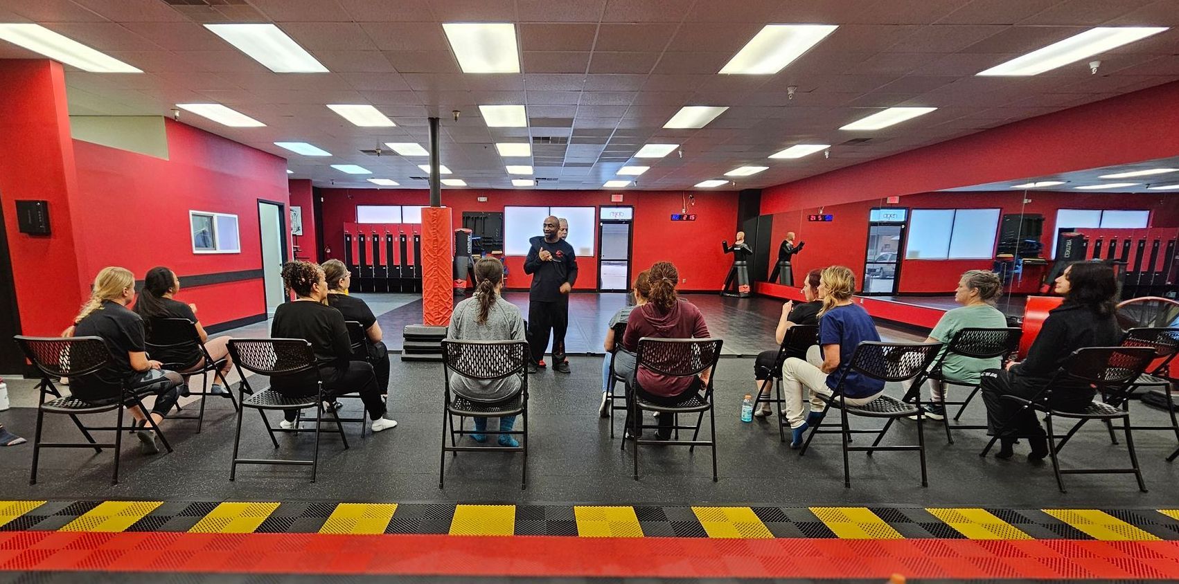 Women Training in our L.A.C.E. self defense course watching the instructor